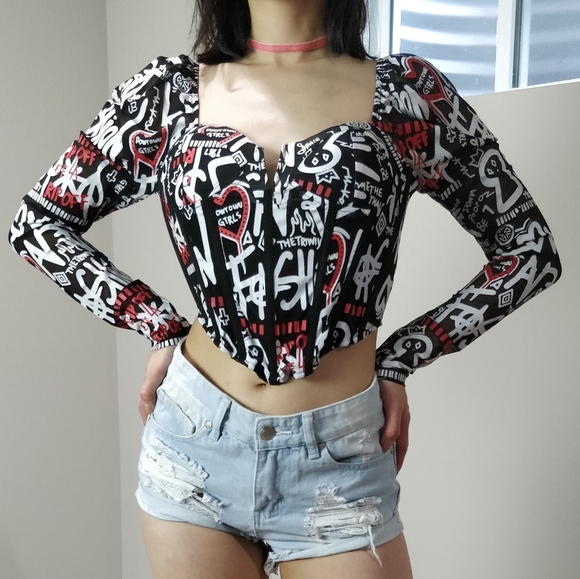 AKIRA Tops - NWT Akira graphic print on black mesh corset top